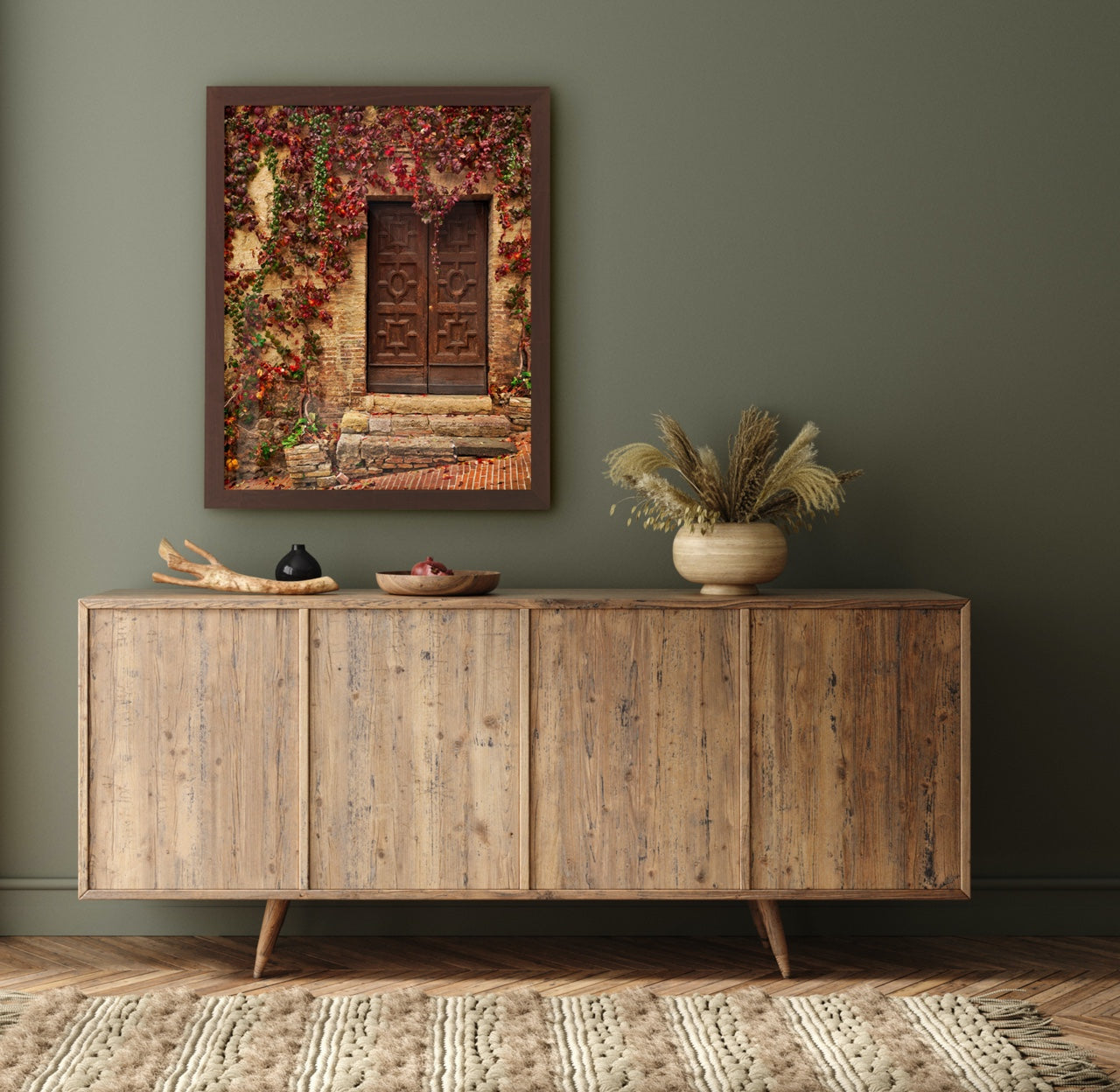 Framed photography with fall leaves over dresser