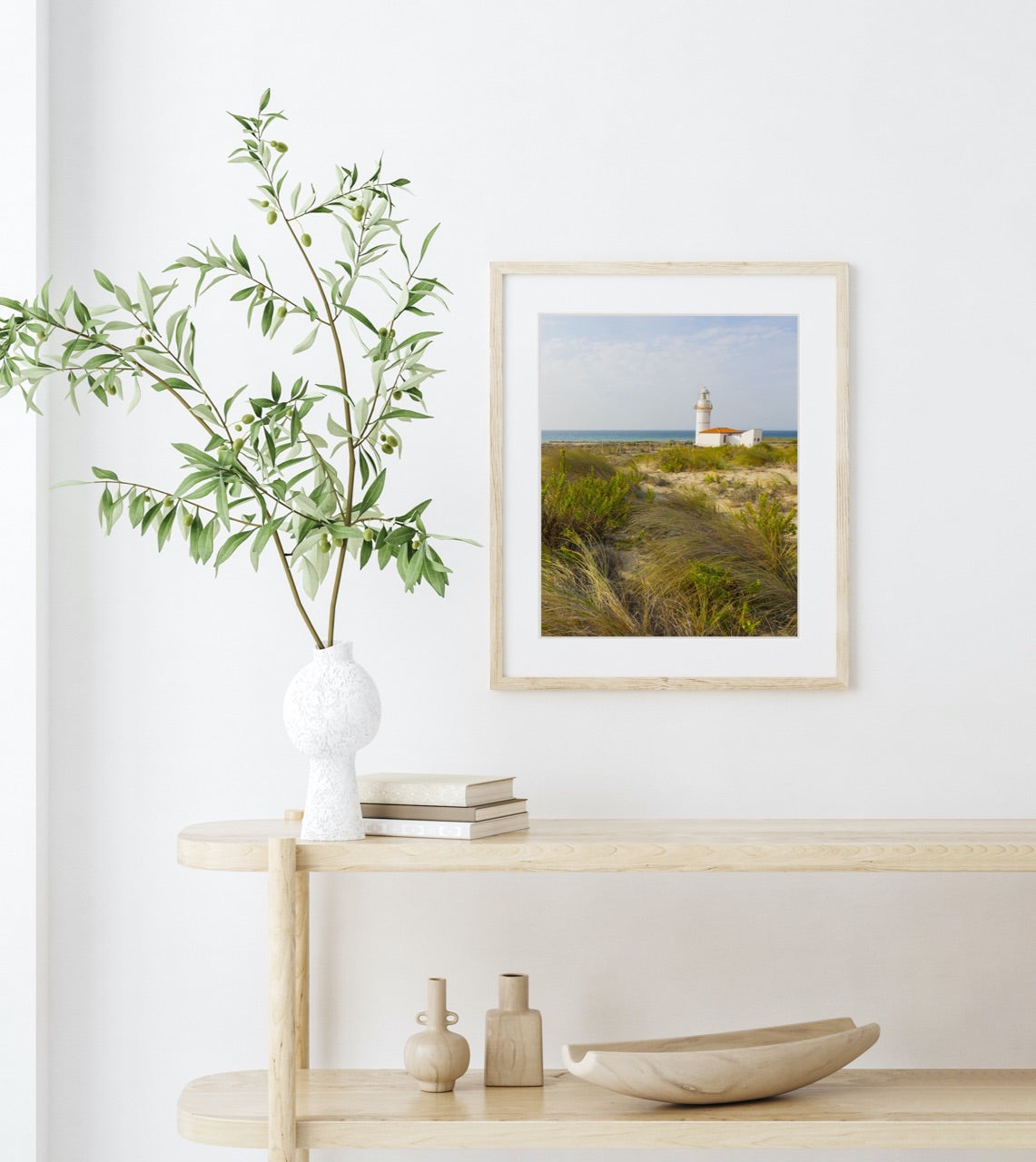 framed lighthouse photograph
