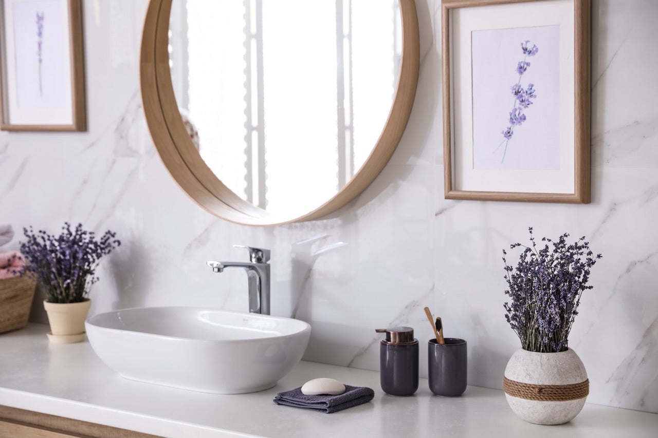 bathroom with lavender art and decor