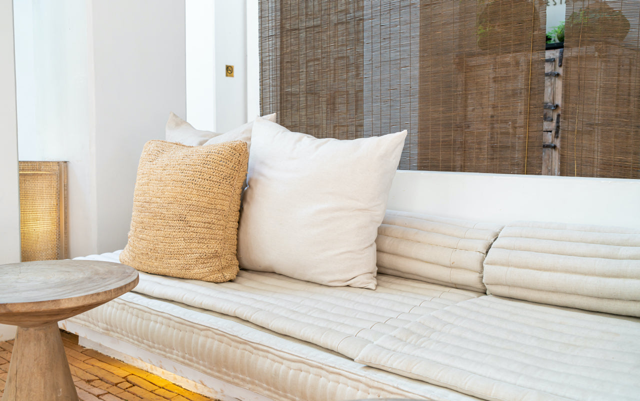 white linen beach house couch