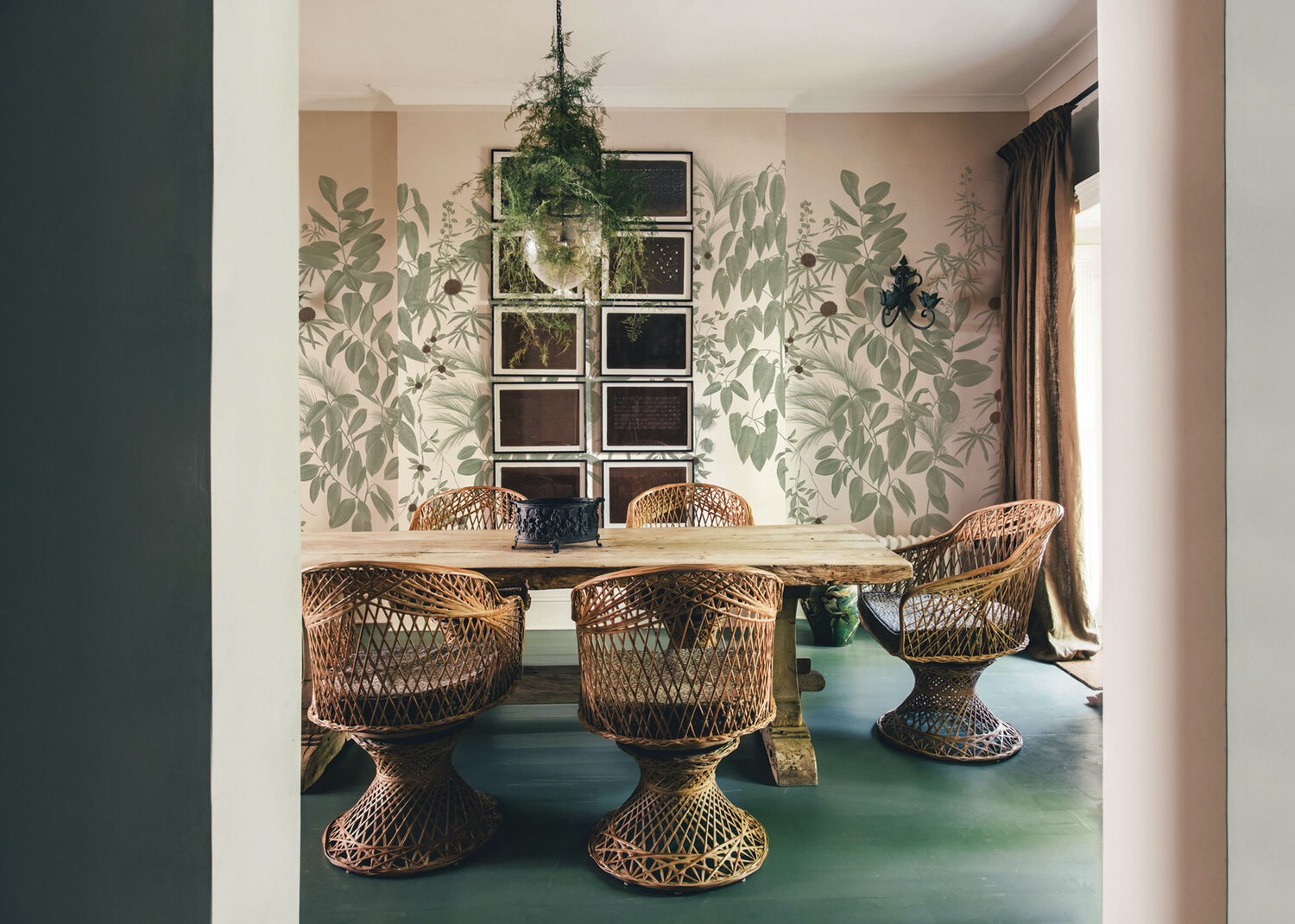 romantic boho dining room with botanical wallpaper