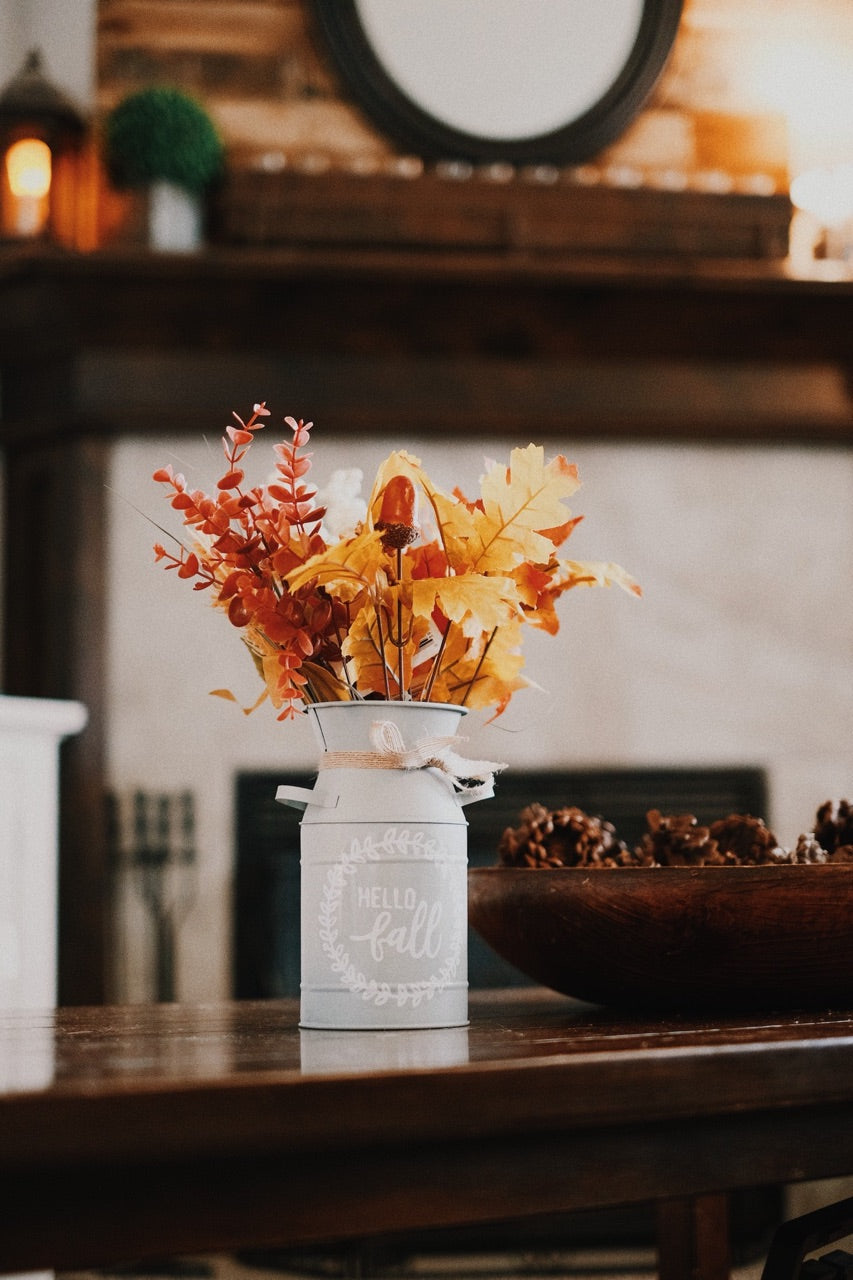 fall leaves in a vase