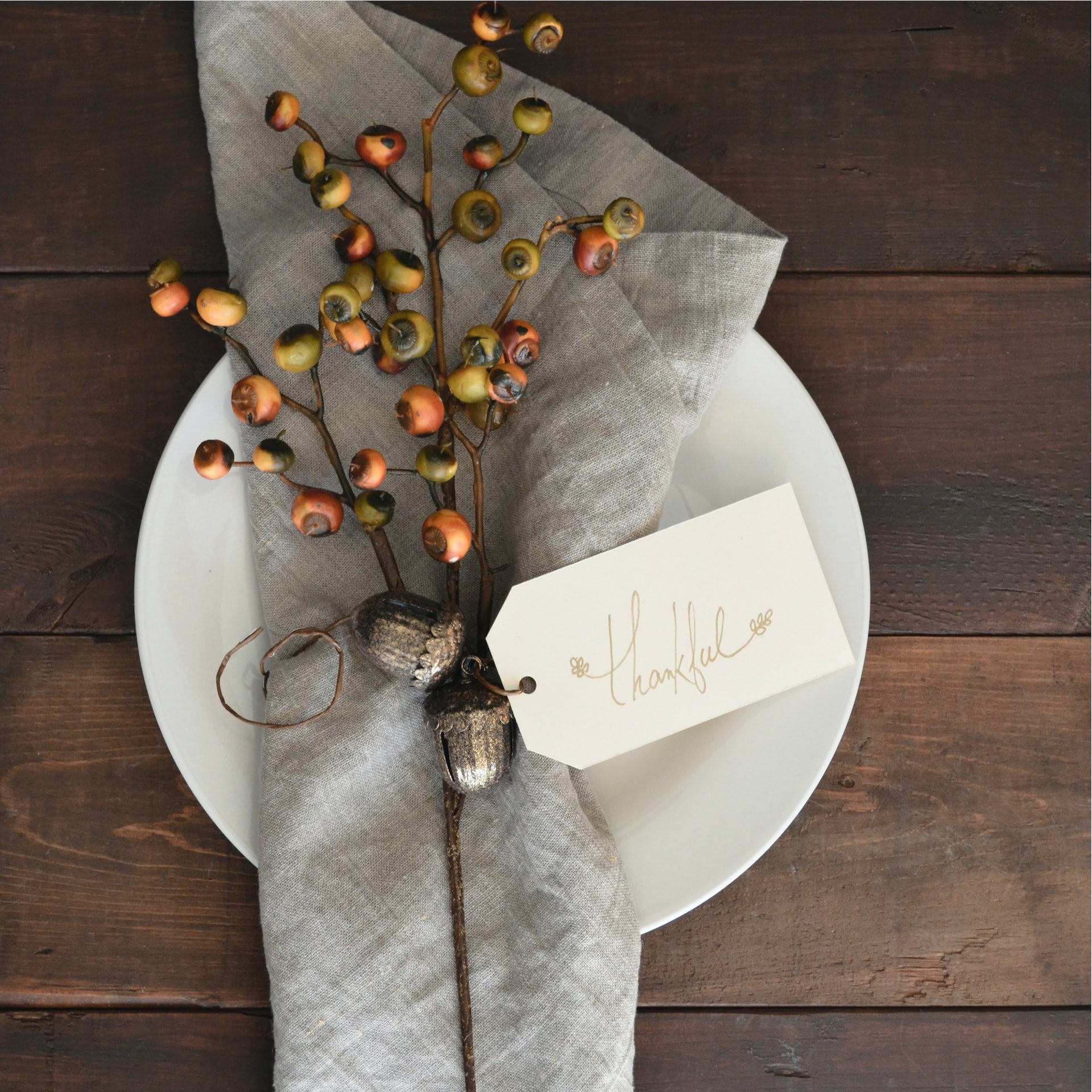 table setting with berry branch