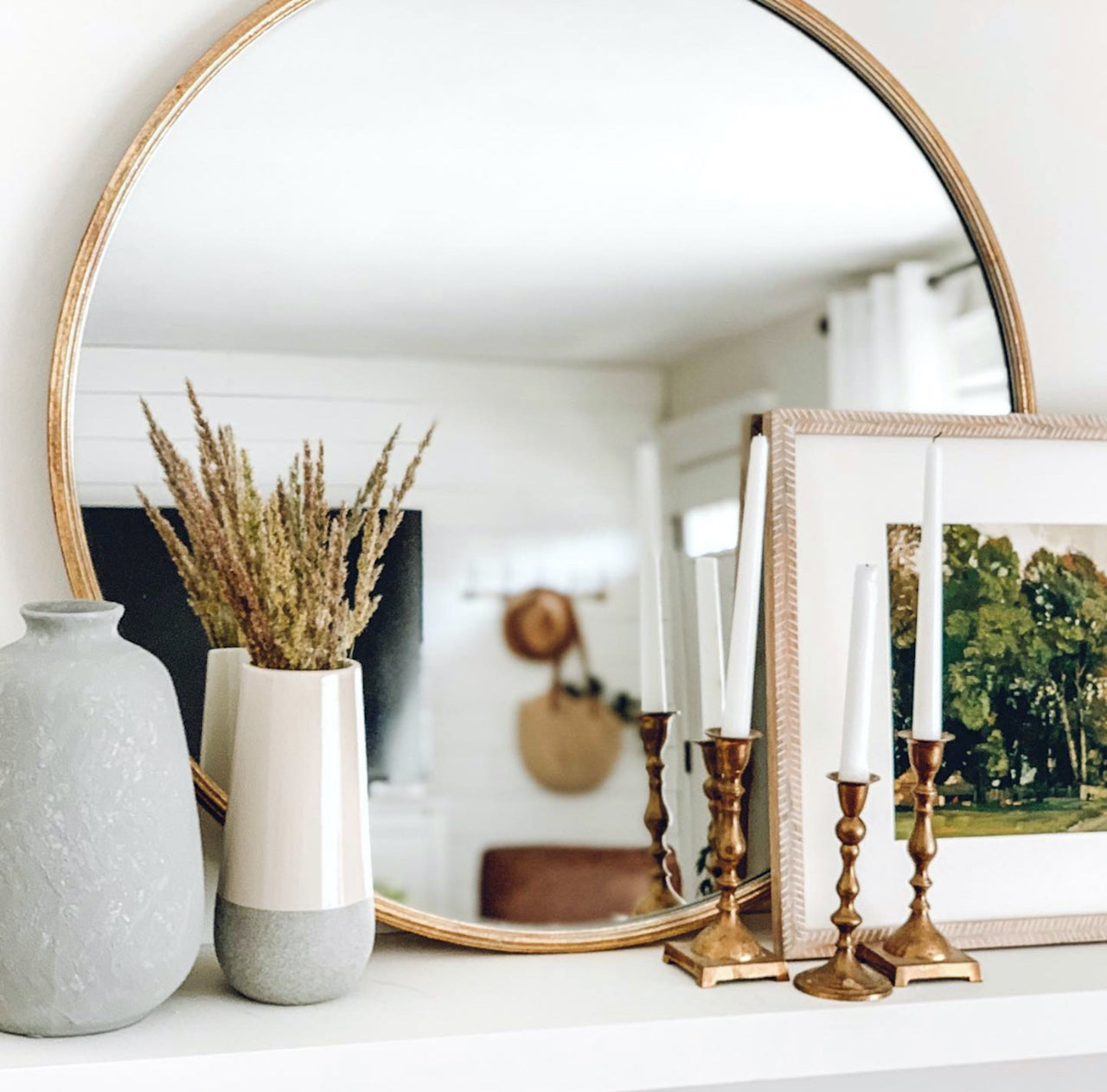 mantle with mirror and farmhouse decor