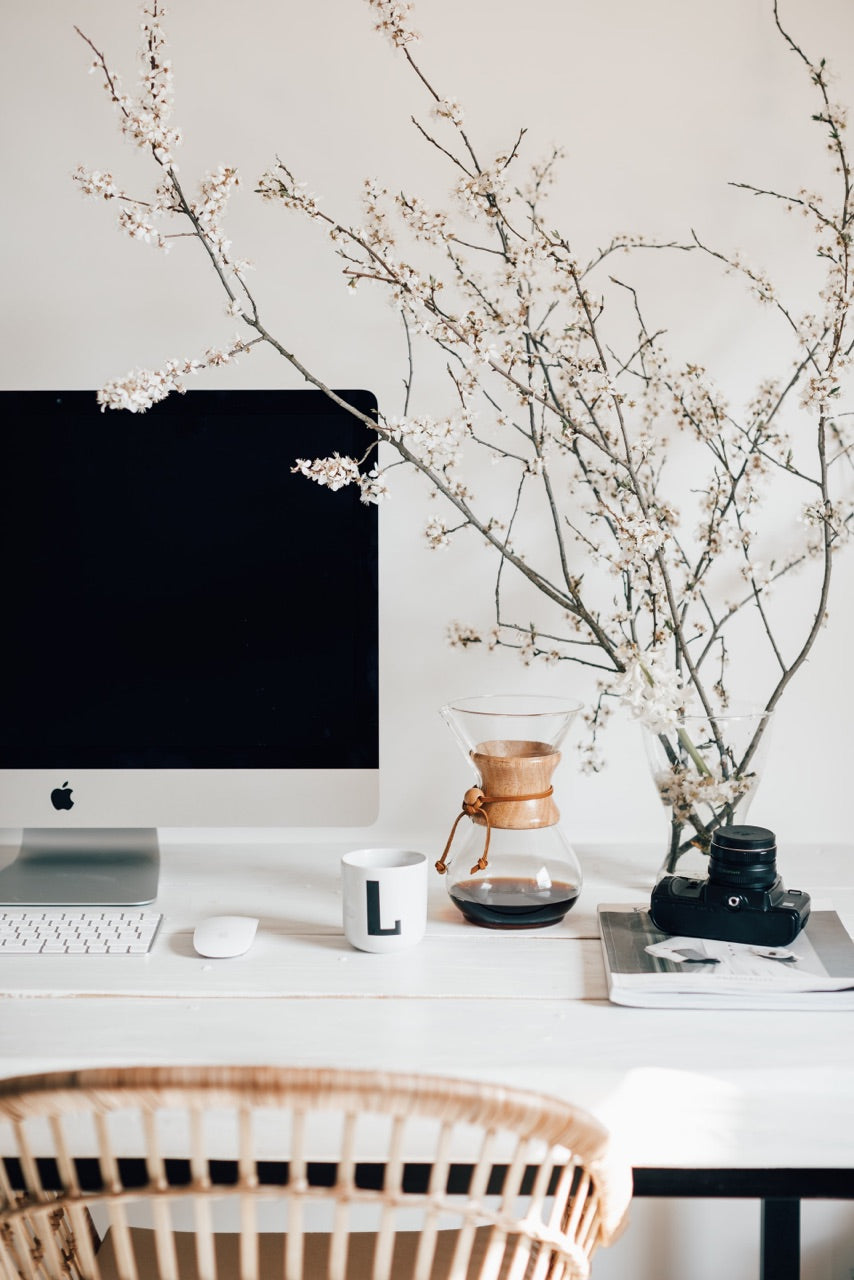modern white desk with cherry blossoms