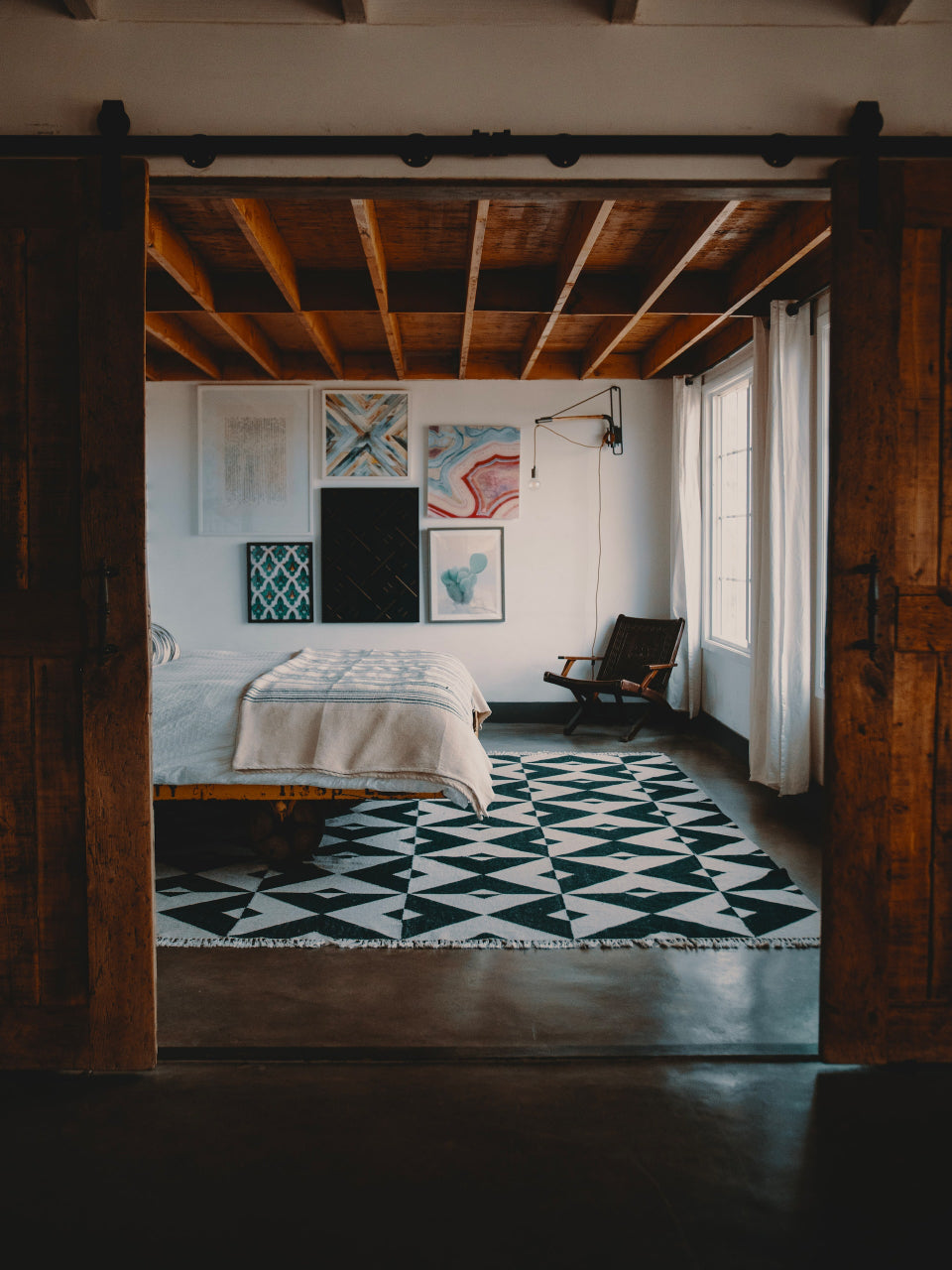 rustic bedroom with gallery wall