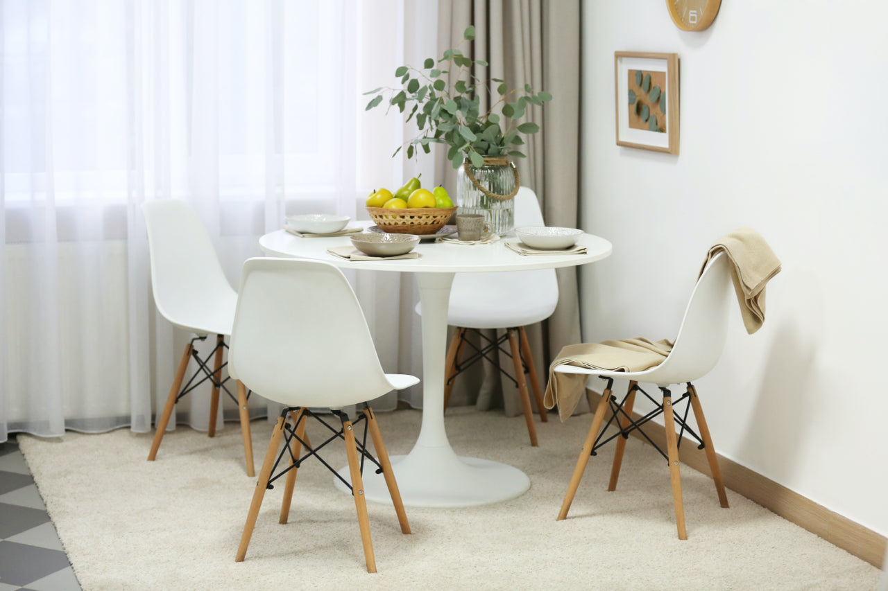 round white dining table and chairs