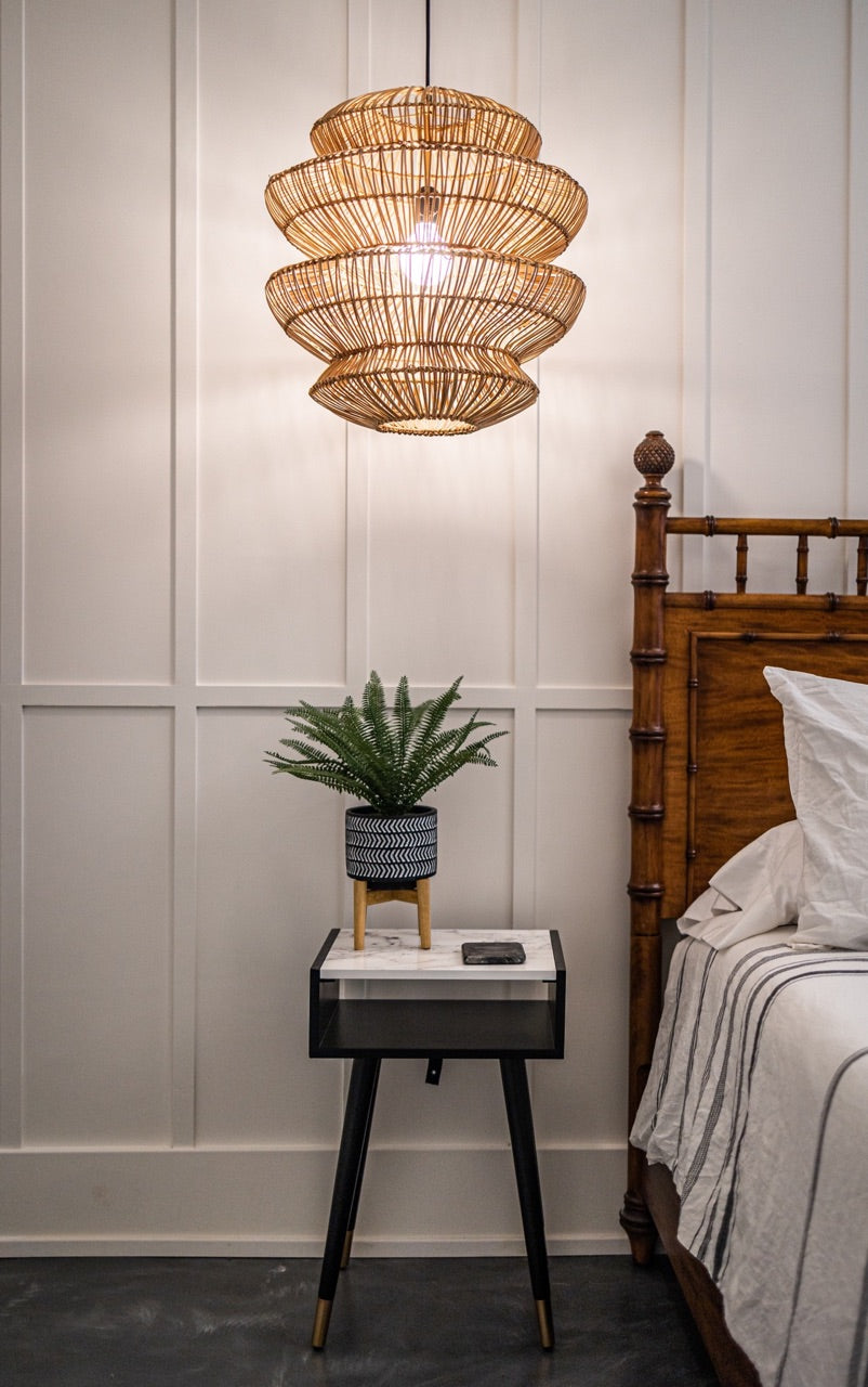 wicker chandelier in bedroom