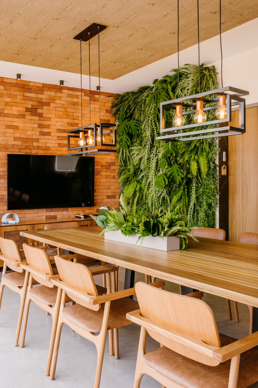 plant accent wall in modern dining room