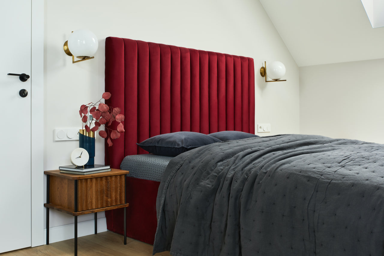 bedroom with deep red headboard