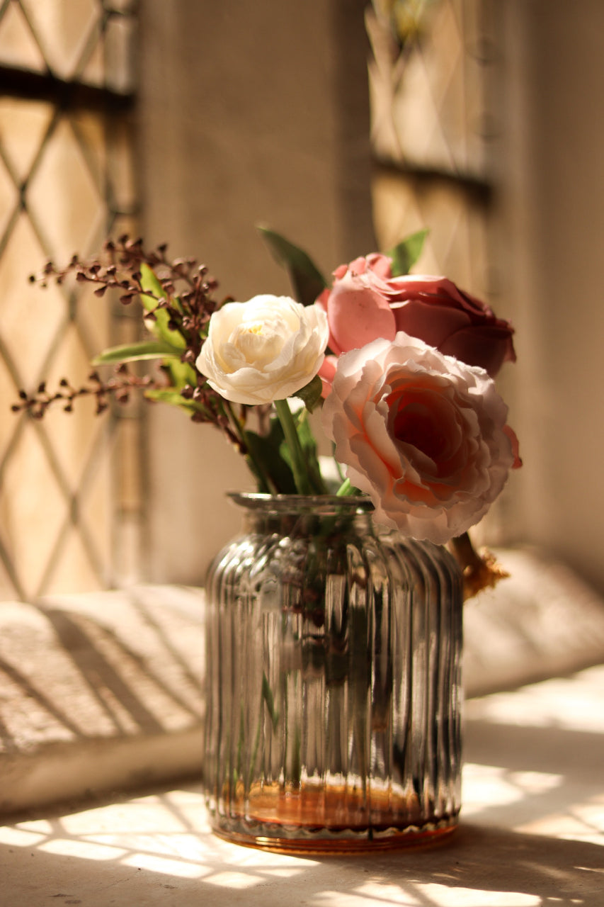 fresh flowers in a glass vase