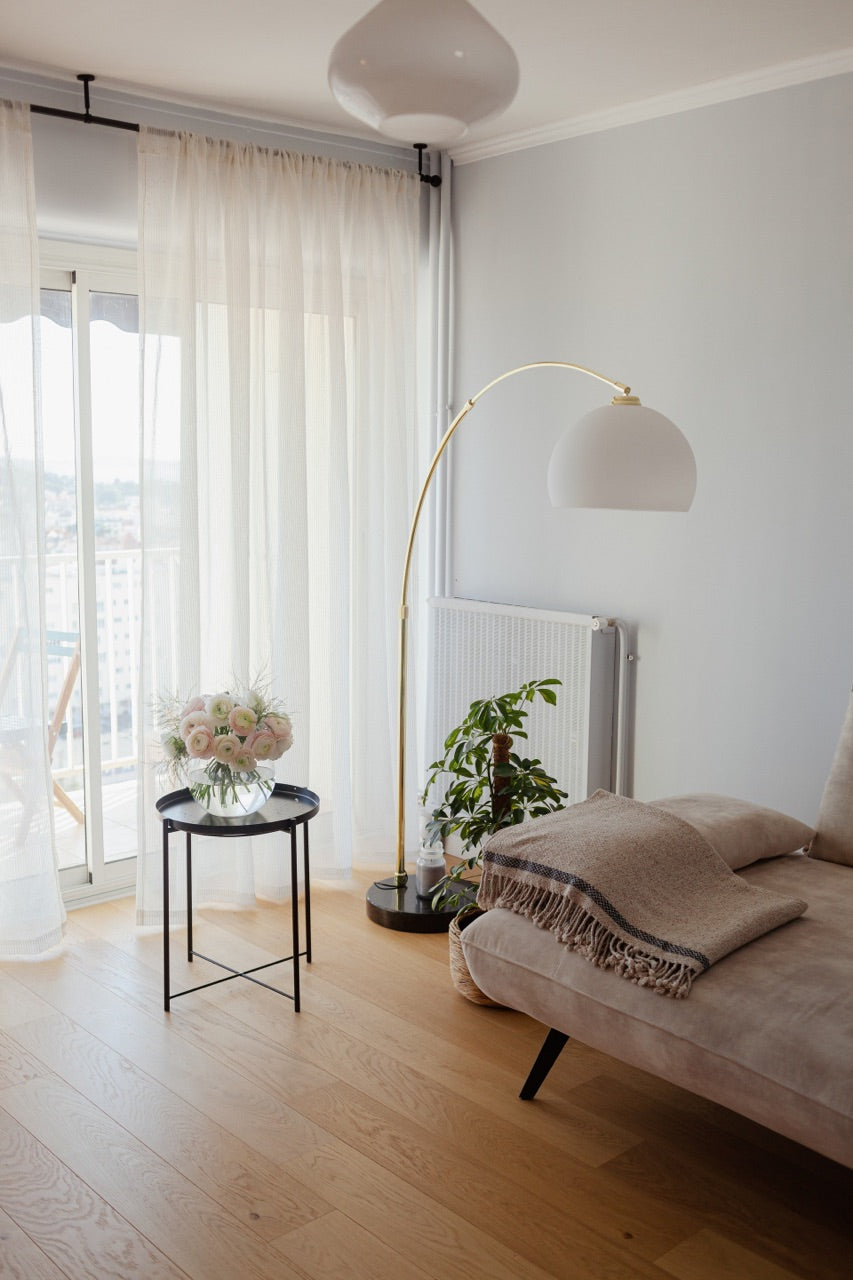 sheer white curtains in apartment living room