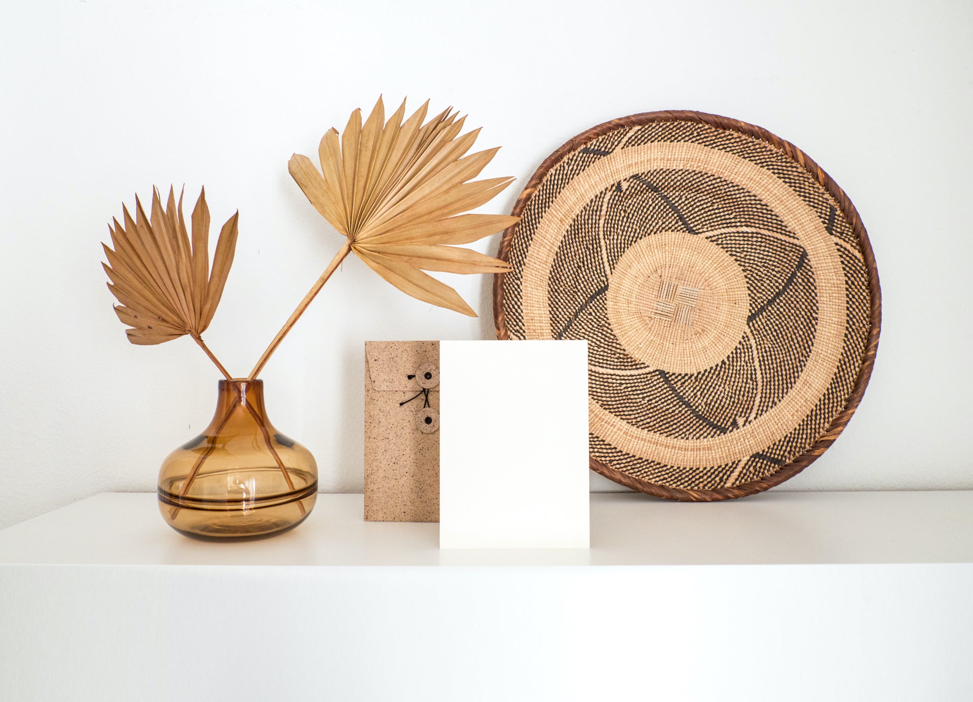 woven basket and dried palm fronds