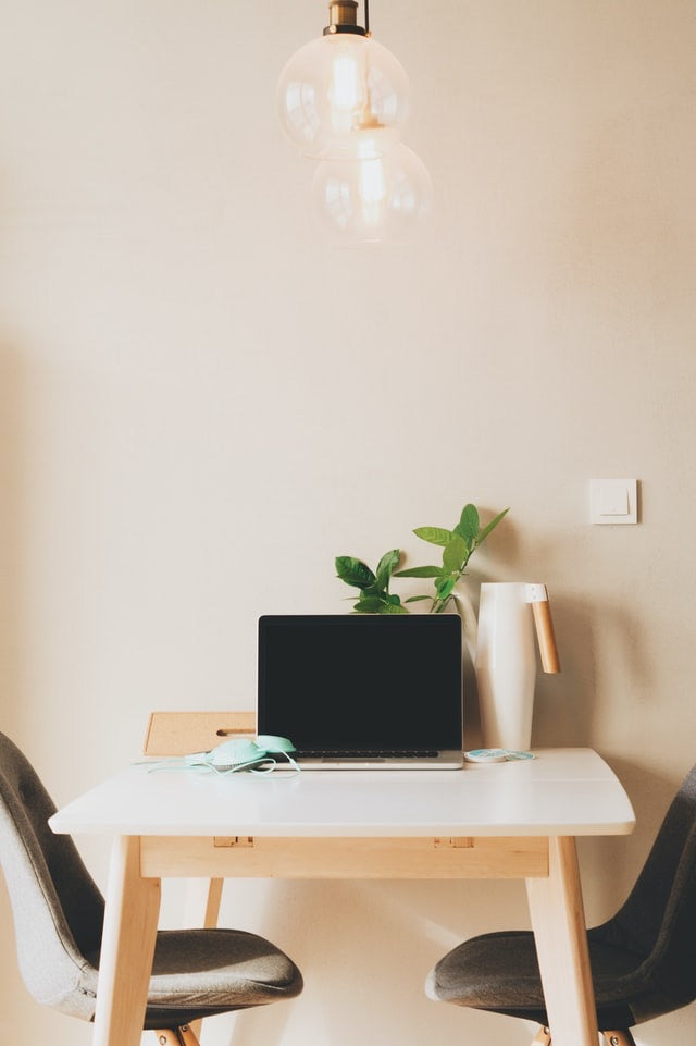 simple office setup with overhead lights