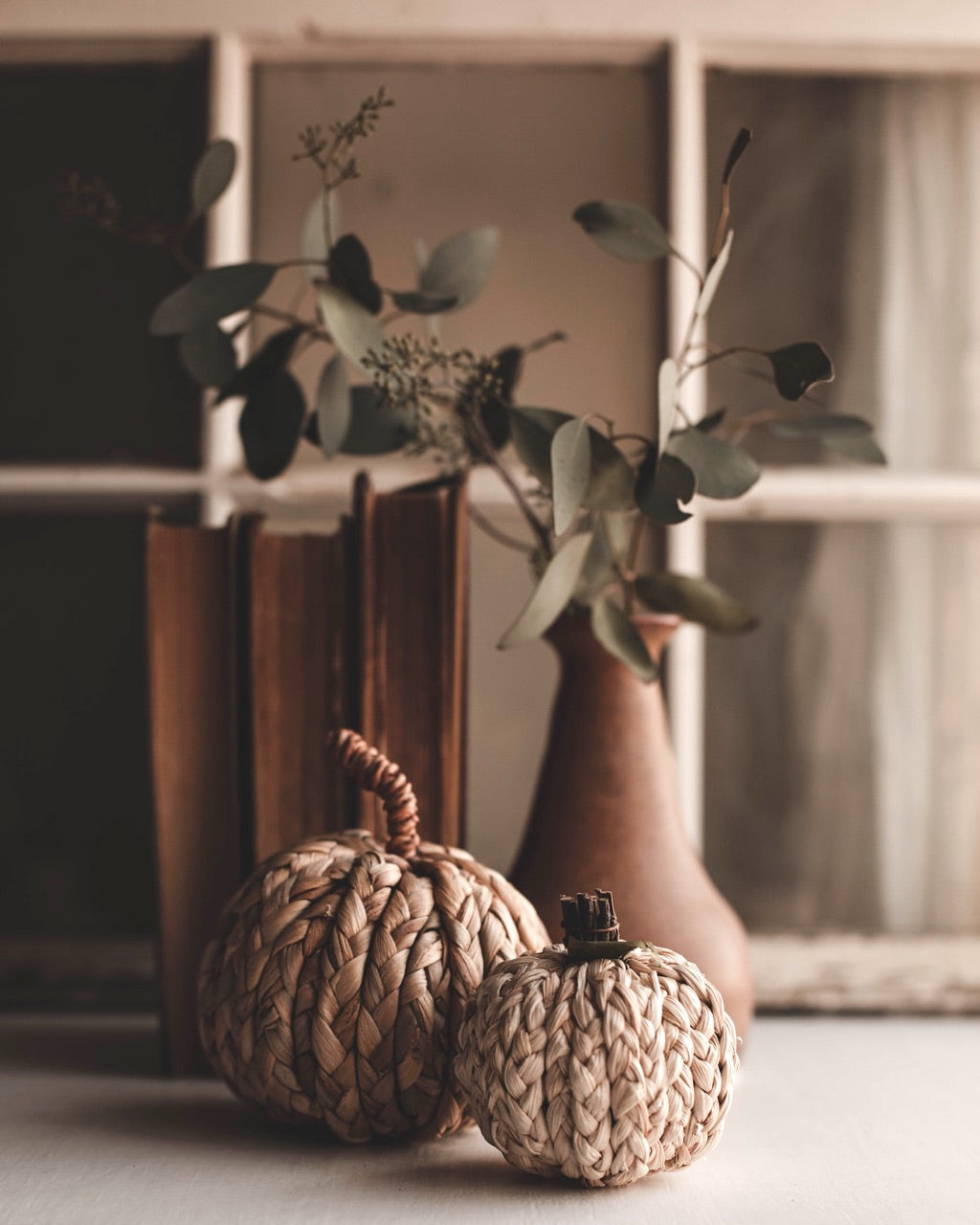 woven pumpkins and vase