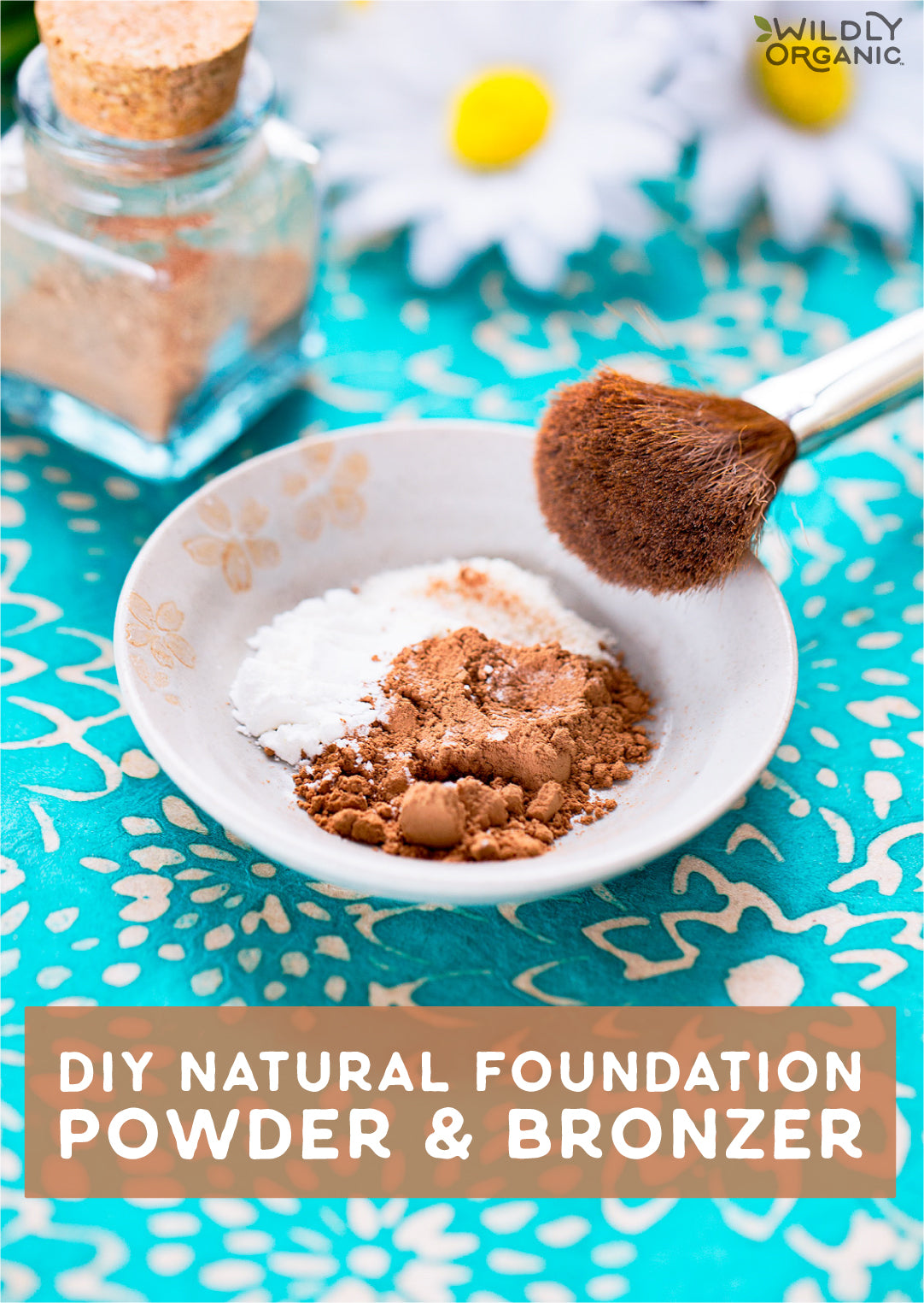 Natural Foundation Powder and Bronzer in a Bowl and a glass jar on a table with a daisy in the background
