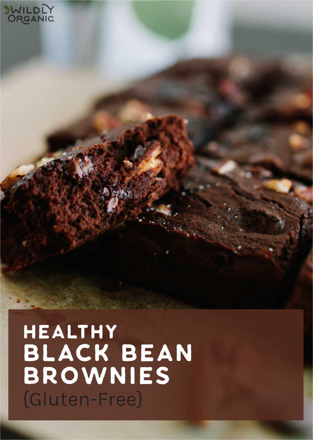 a close-up of healthy black bean brownies and wildly organic packaging in the background