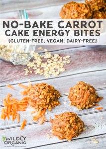 A vertical photo of no-bake carrot cake energy bites with shredded carrots and a jar of gluten-free oats.