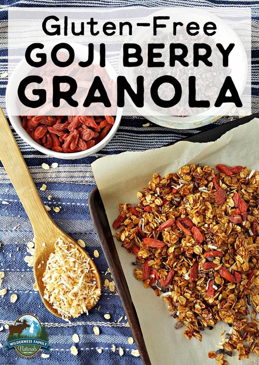 Photo of a sheet pan with goji berri granola and a bowl of goji berries.