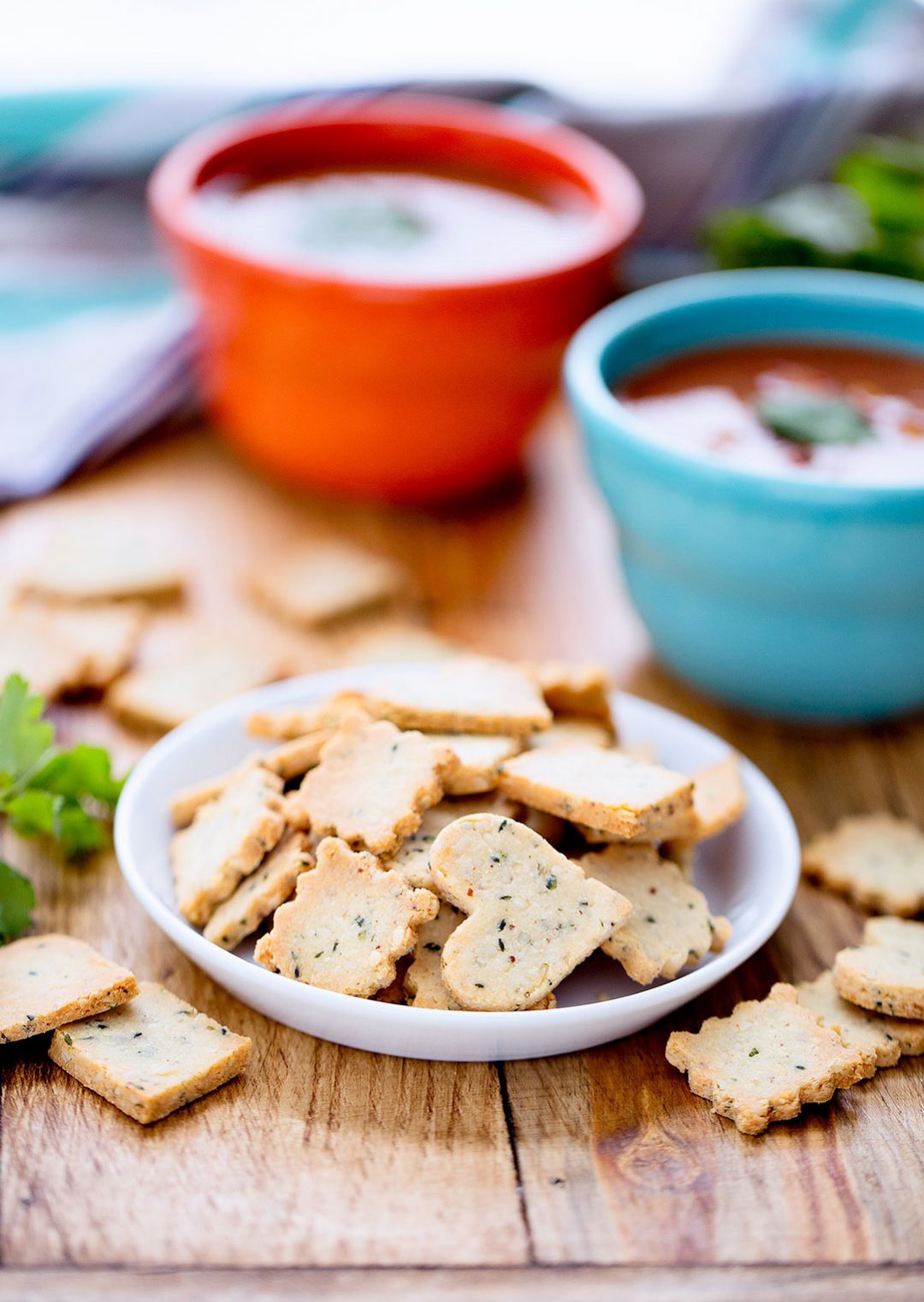 Homemade Hemp Heart Crackers | Homemade hemp heart crackers are so much more than a soup topping! Pack them in lunch boxes for a crunchy snack. Grind the crackers to mix into meatballs or top casseroles. Spread them with nut butter or jam for a filling snack. Don't forget to include on your cheese trays! | WildernessFamilyNaturals.com