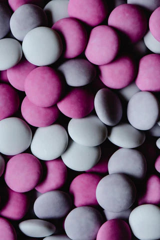 Pink and grey wax pastilles