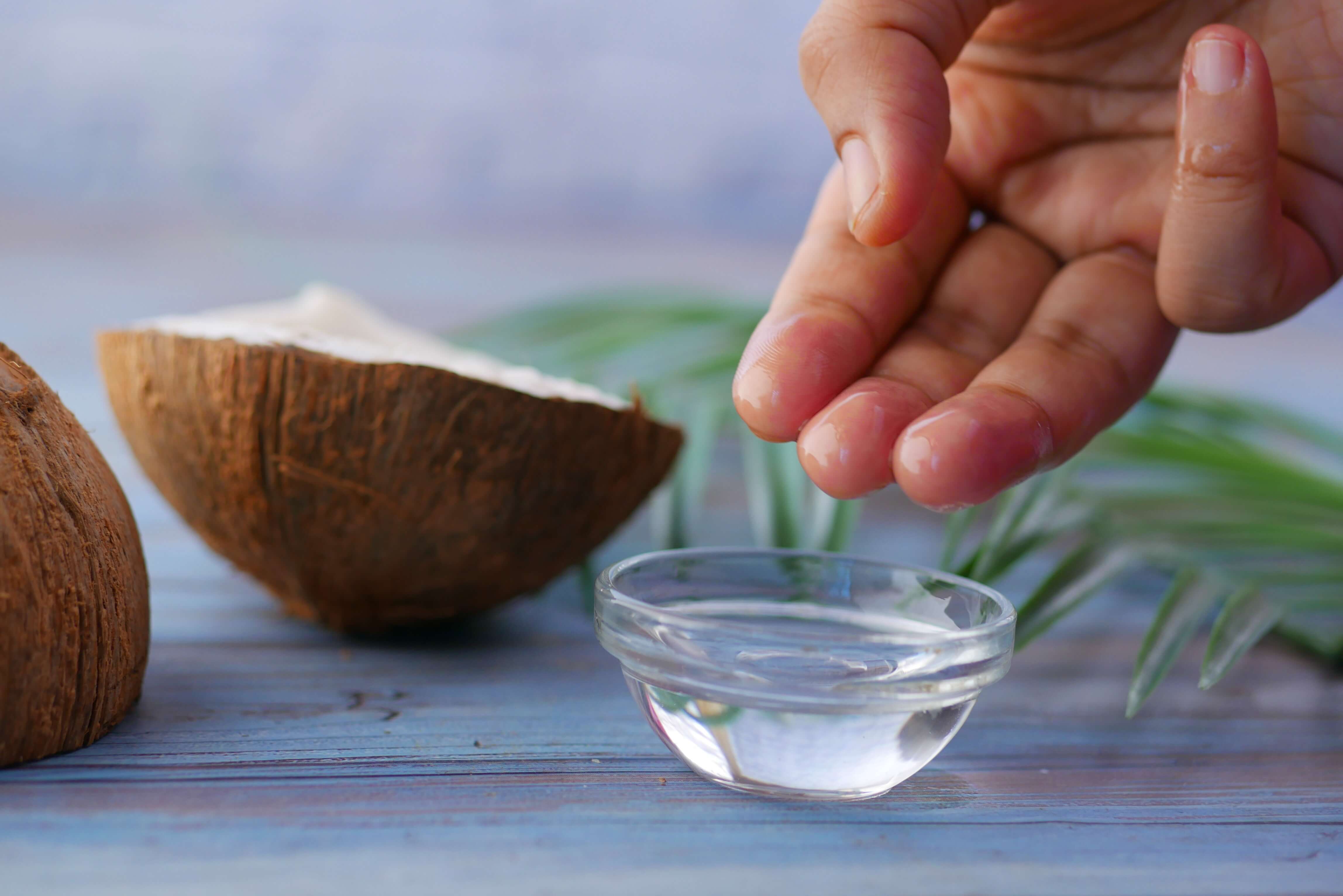 Glass bowl with liquid coconut oil