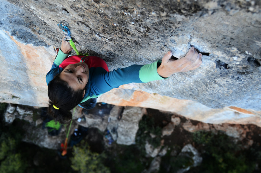 climber on rock wall