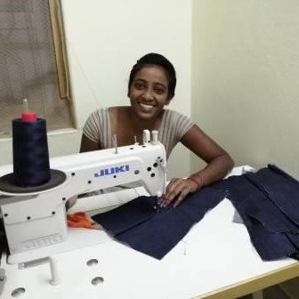 Bhanu at sewing machine