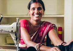 Sasmita happily working at the Holi Boli sewing house. Image credits: Holi Boli