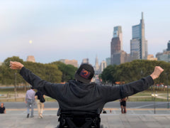 Rocky steps in Philadelphia with arms of victory 