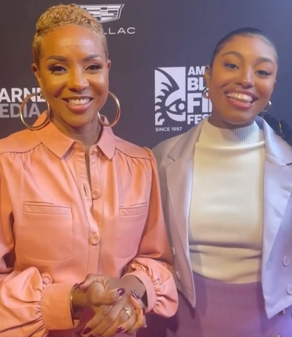 MC McLyte wearing the Petersham By-Product Leather Mini Jumpsuit in Peach at The American Black Film Festival | Styling - Jason Griffin - November 2021