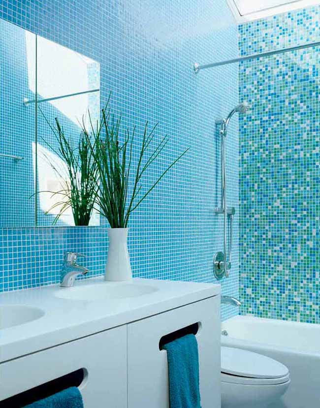 Bathroom with aqua blue interior walls