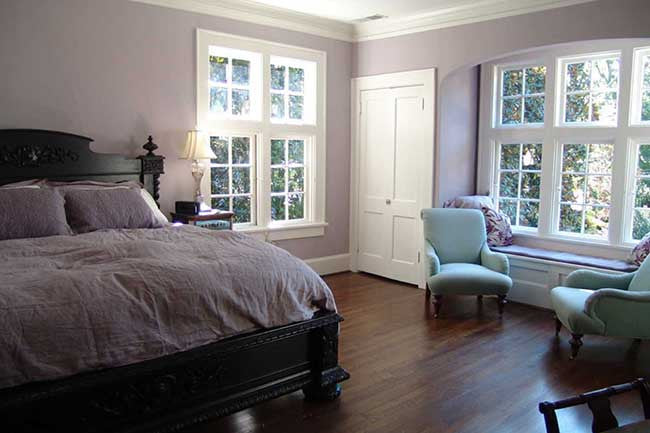 Bedroom with light purple and lilac walls