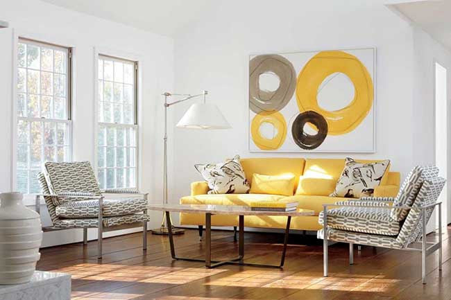 White living room with yellow couch