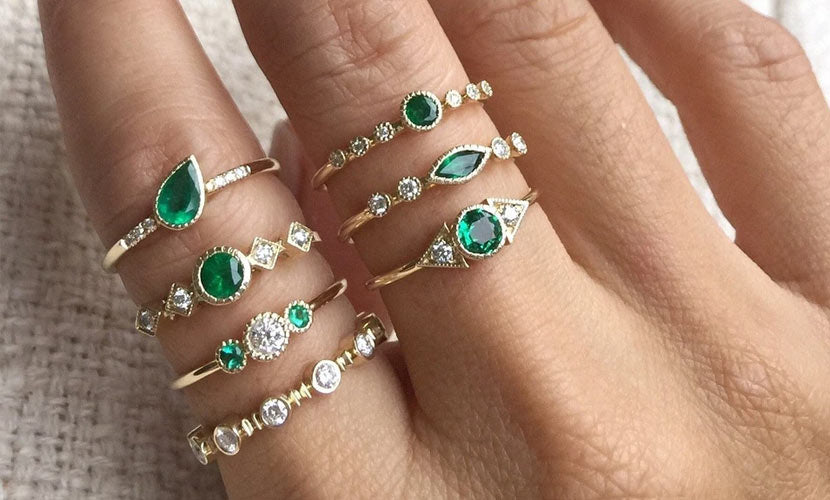 Jennie Kwon emerald rings modelled on hand