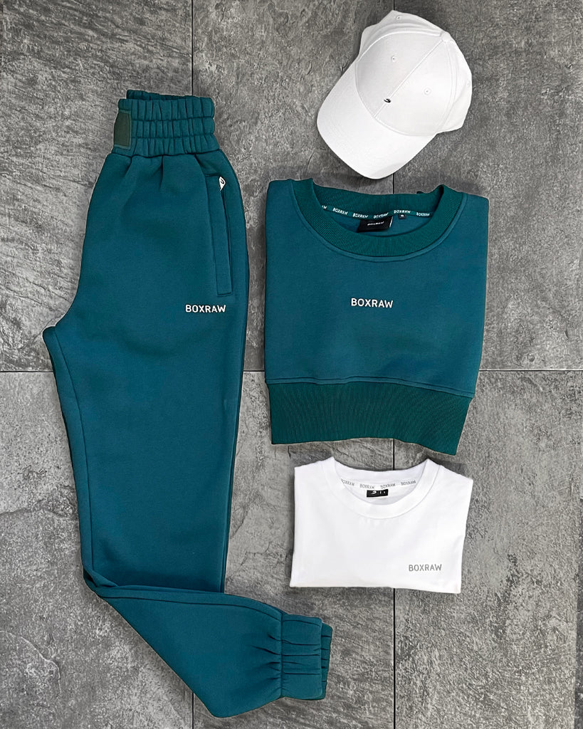 On the move? Layer up with the Teal Johnson Tracksuit while running errands.