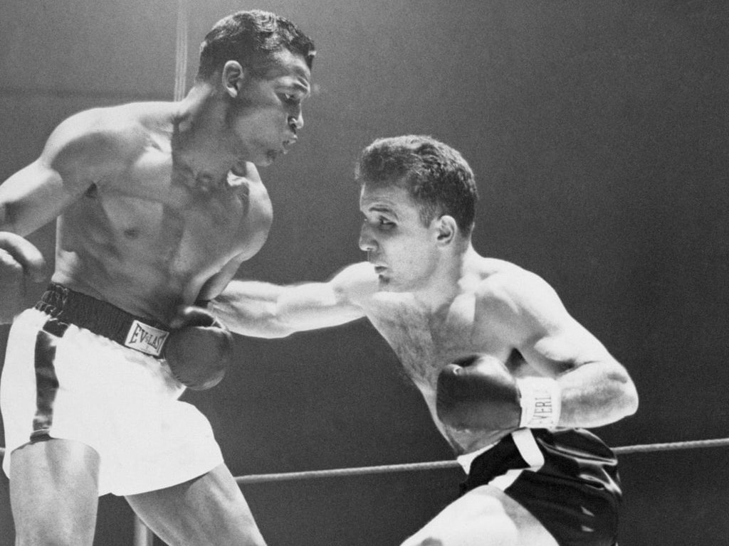 Photo: Bettmann Archive - Sugar Ray Robinson and Jake LaMotta collide for the sixth and final time in 1951.