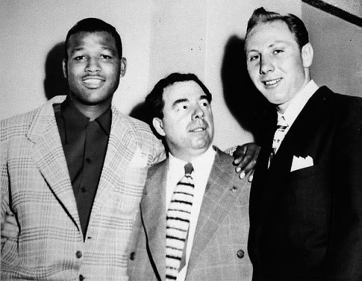 Sugar Ray Robinson poses with gangster Blinky Palermo.