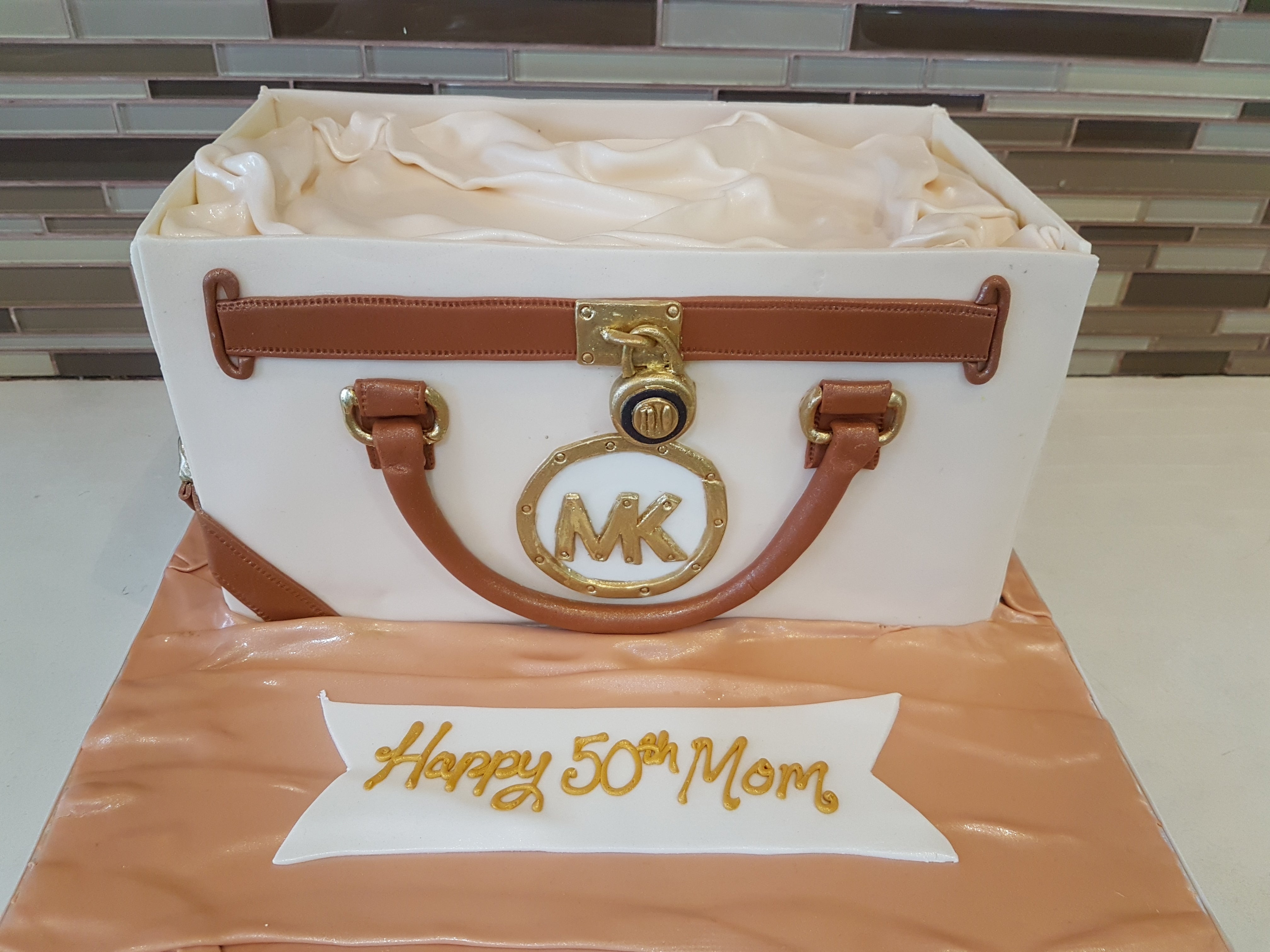 mk purse cake