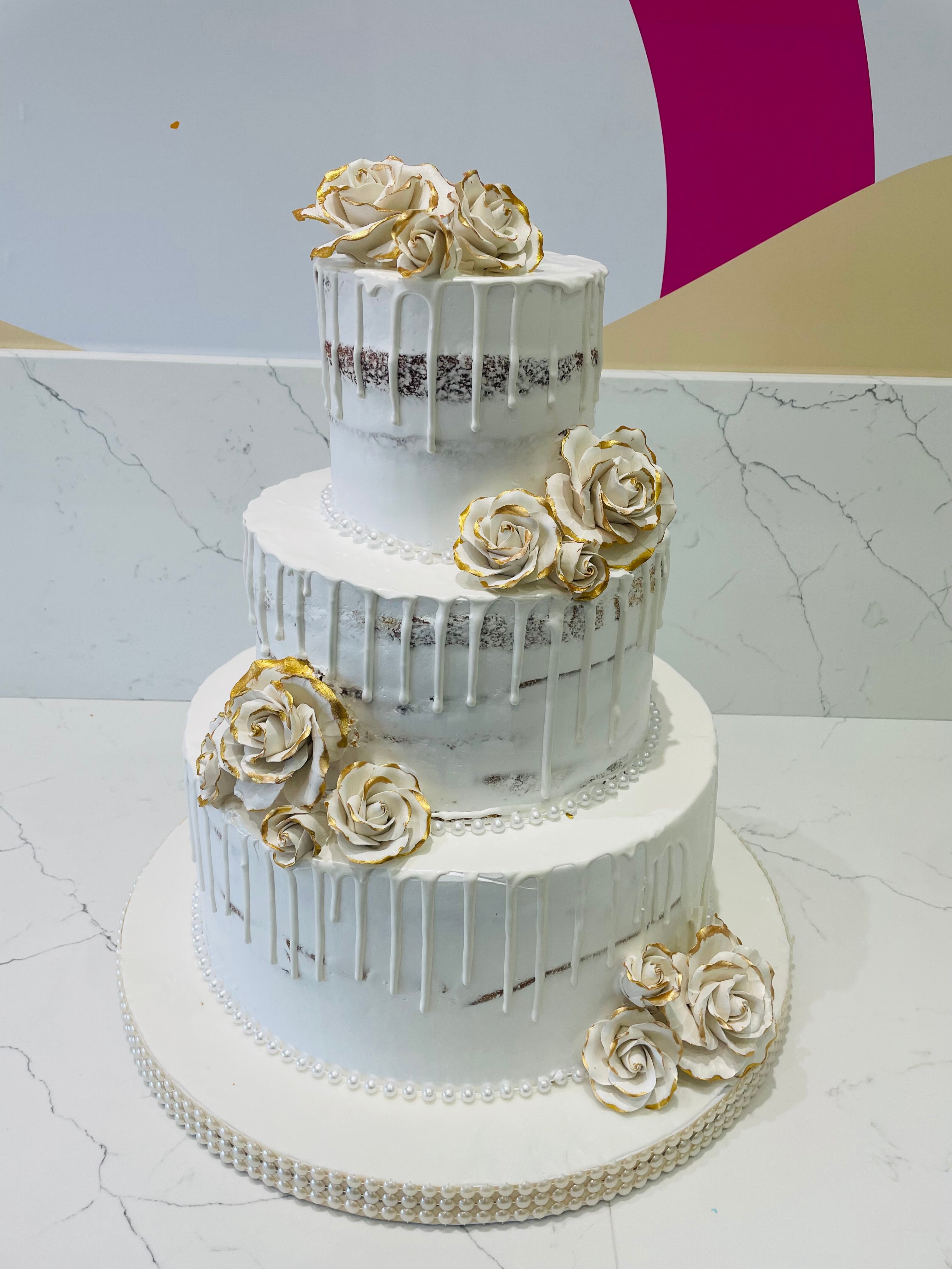 Gold And White Drizzle Wedding Cake Rashmis Bakery