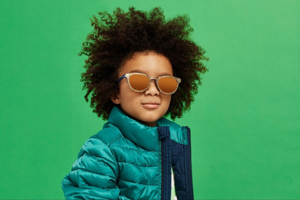 Boy wearing a pair of UV protection glasses