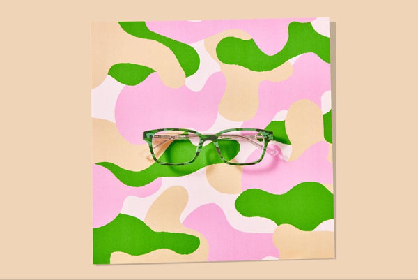 Glasses on a colorful background