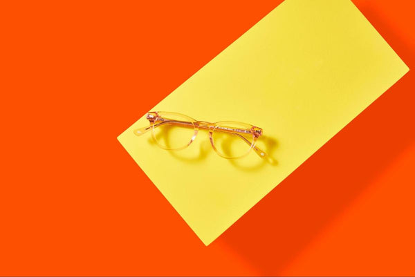 Girls glasses: glasses on a yellow and orange background