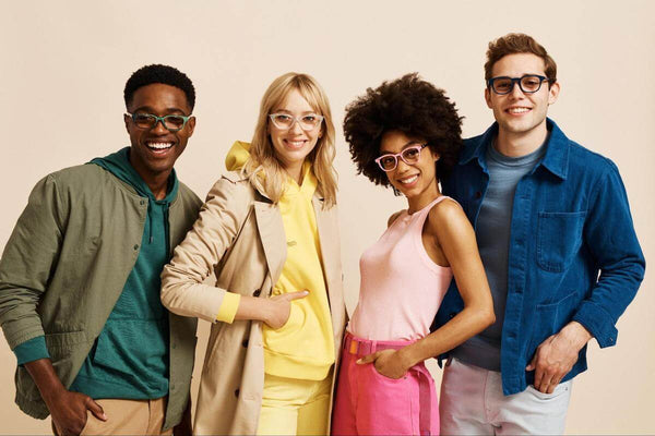 Group of friends happily wearing eyeglasses