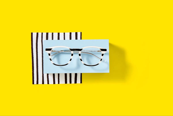 Stripes eyeglasses on a yellow background