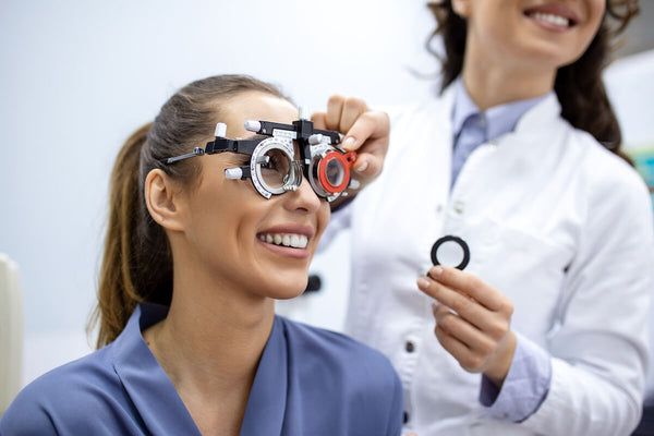 Woman consulting an optometrist