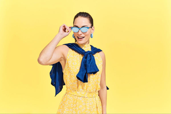 Woman wearing a pair of beach sunglasses