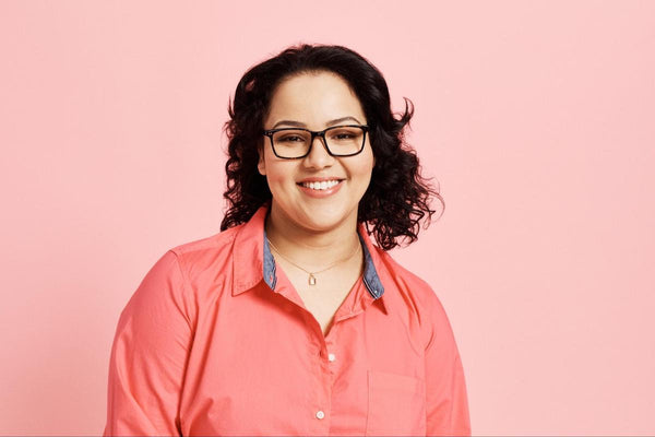 Square glasses frames: woman wearing a pair of eyeglasses