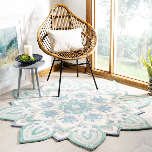 Safavieh Novelty 6' Round Hand Tufted Wool Rug in Blue and Ivory