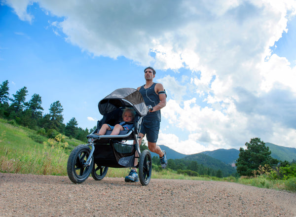 Close Up of a Father Running with a BOB Revolution Flex Jogging Stroller